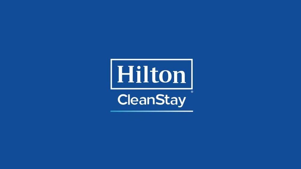 Doubletree By Hilton Doha - Al Sadd Hotel Bagian luar foto Hilton CleanStay logo